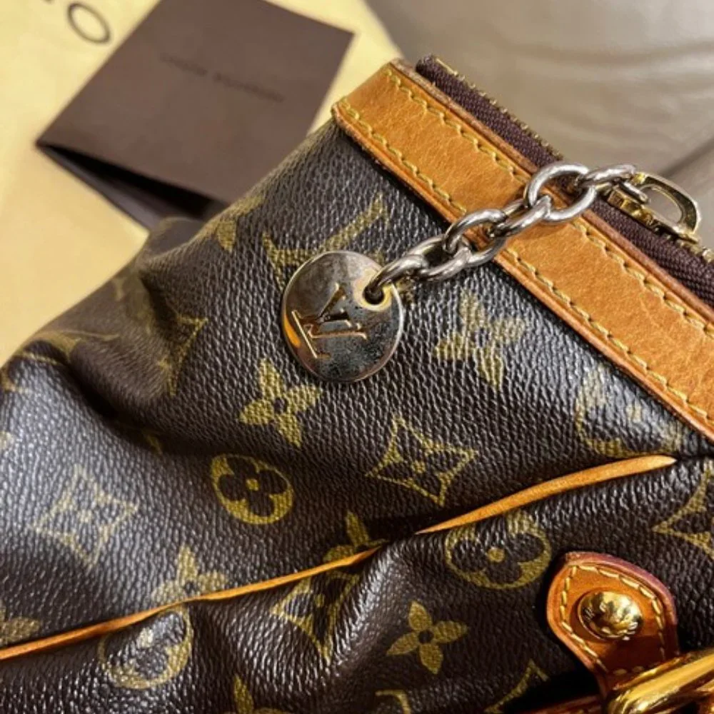 Louis Vuitton Tivoli Gm Brown Leather Hobo Bag